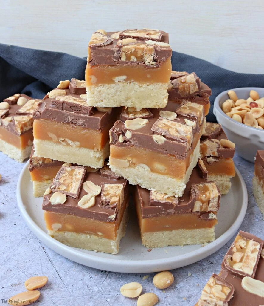 A stack of Snickers Millionaire's Shortbread