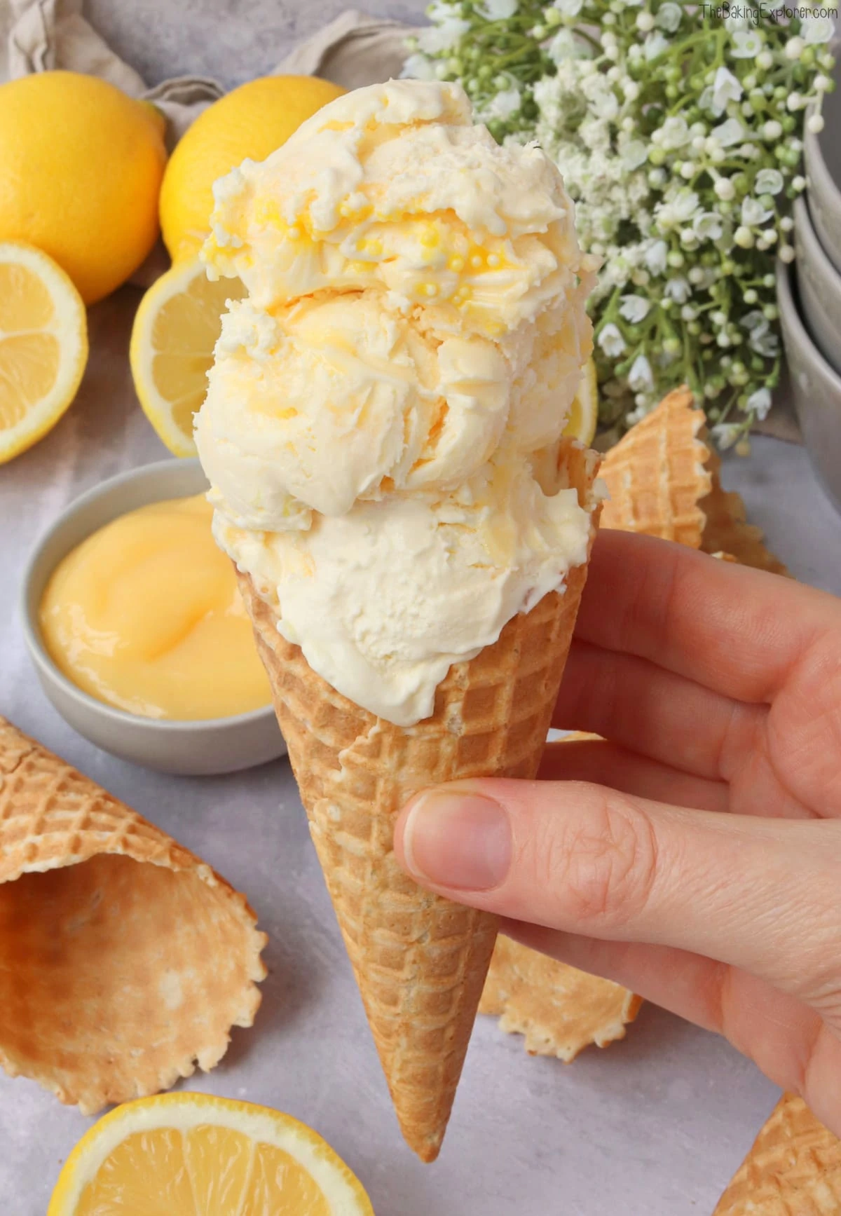 Lemon Curd Ice Cream (No Churn) in a waffle ice cream cone